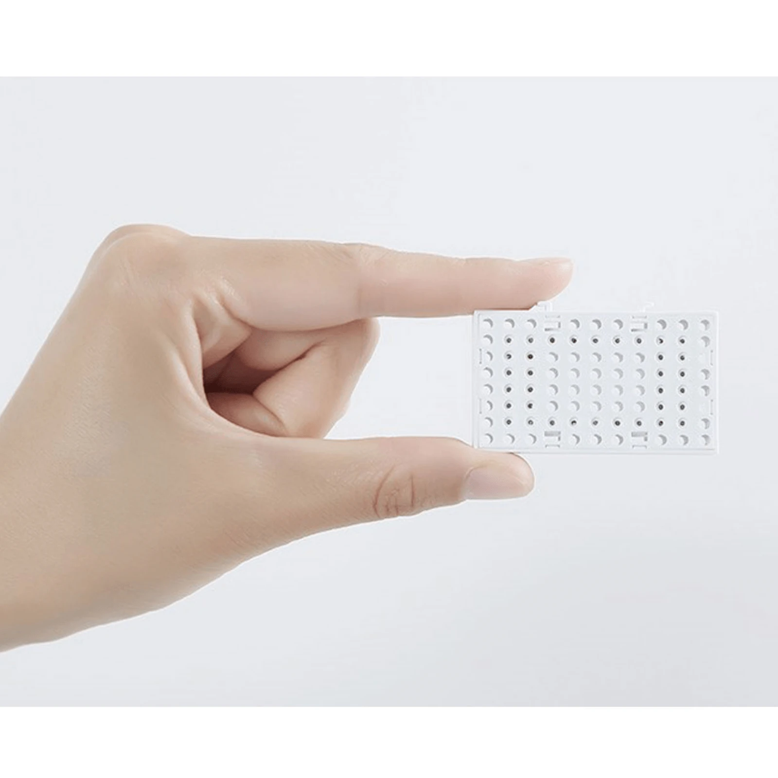 wood cat tower showing thick sisal posts and modular shelves