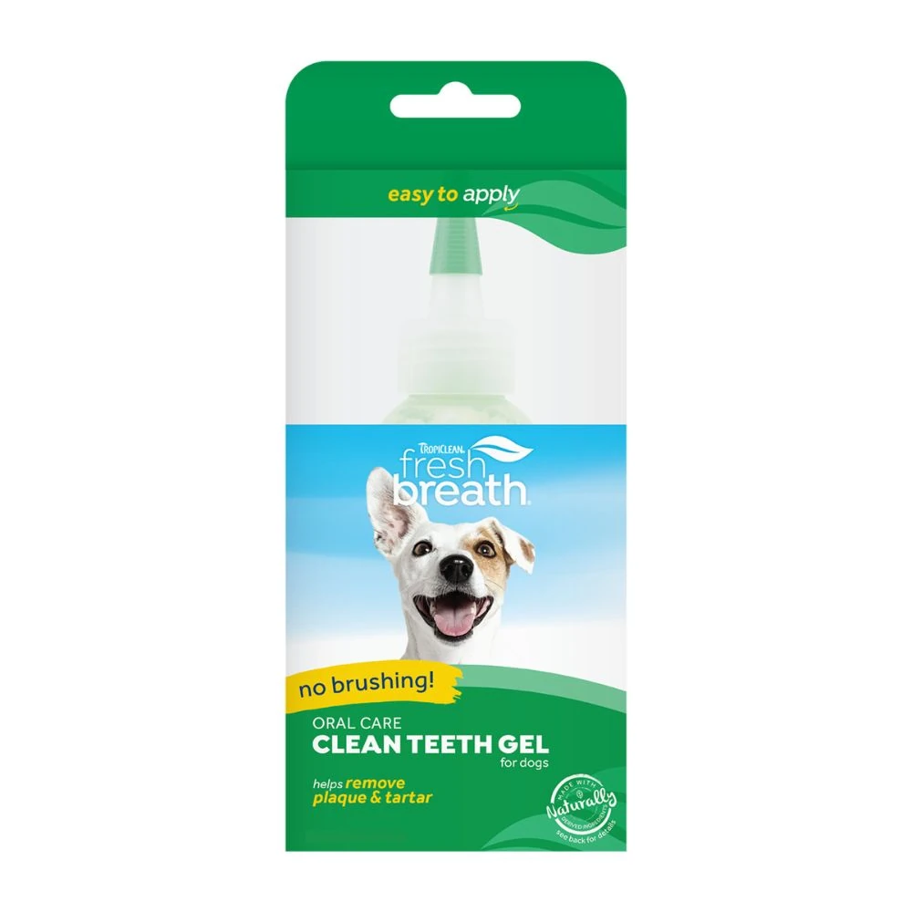 designer dog crates setup near TropiClean oral gel for complete pet care